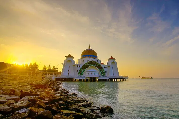 Masjid Selat Melaka, the Straits Mosque, standing over the water at sunset