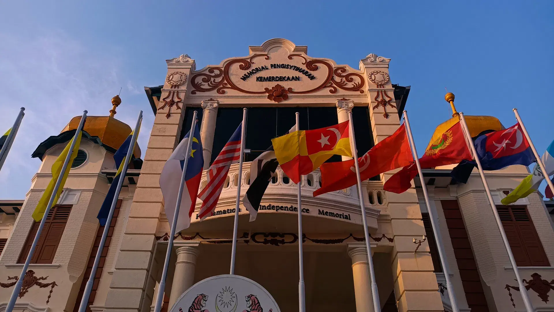 The Proclamation of Independence Memorial in Melaka, state flags flying in front of it