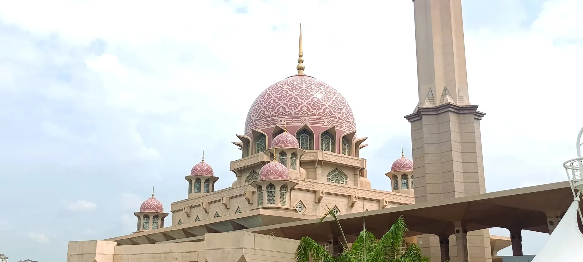 The pink dome and minaret of Putra Mosque in Putrajaya